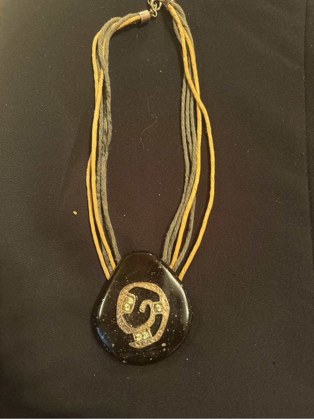 Multi-Strand Black and Mustard Pendant Necklace with Gold Accent